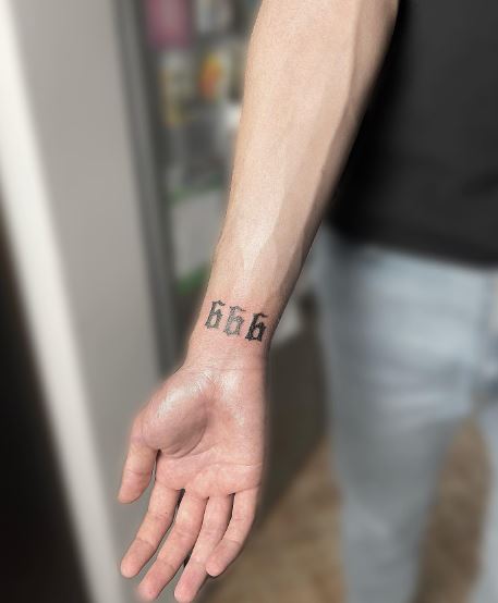Black Minimalistic 999 Wrist Tattoo