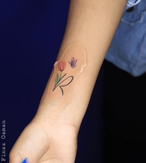 Initial Letter R with Flower and Butterfly Forearm Tattoo