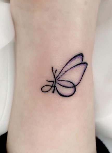 Black Initial Letter with Butterfly Forearm Tattoo