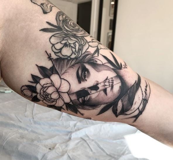 Half Girl Face Half Skull with Flowers Biceps Tattoo