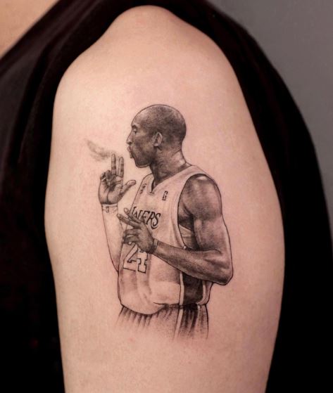 Kobe Bryant Smoking Fingers Arm Tattoo