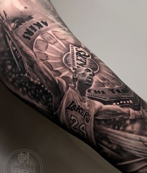 Kobe Bryant Portrait with Spread Arms Forearm Tattoo