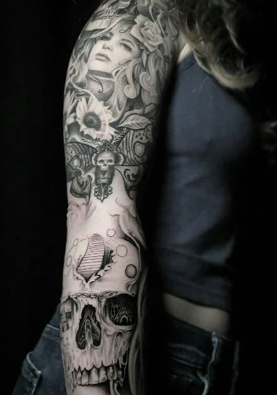 Woman with Death Moth and Skull Arm Tattoo