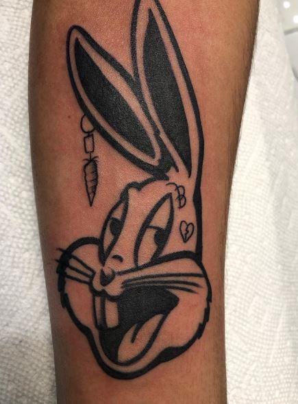 Bad Bunny with Carrot Arm Tattoo