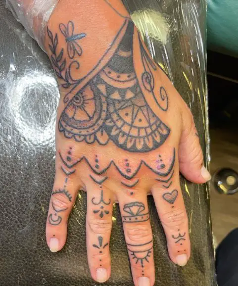 Grey Symbols Knuckles Tattoo