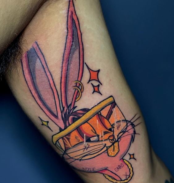 Pink Bad Bunny with Glasses Inner Biceps Tattoo