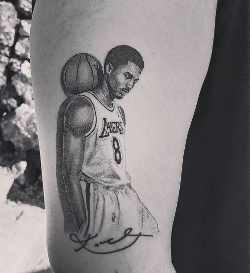 Kobe Bryant with Basketball Arm Tattoo