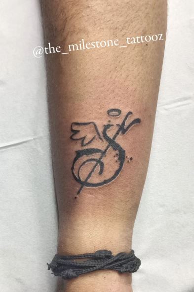 Initial Letter S with Halo and Angel Wing Forearm Tattoo