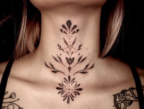 Symmetrical Flowers Throat Tattoo