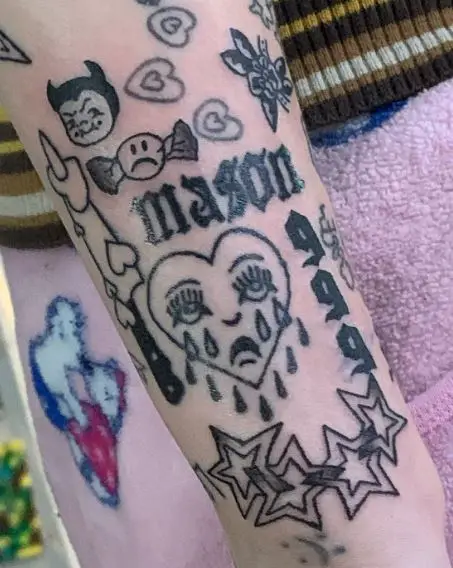 Crying Heart, Stars and 999 Arm Tattoo