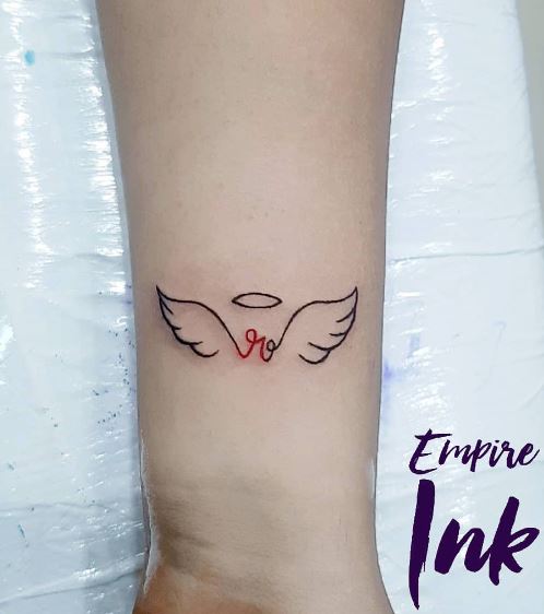 Initial Letter with Halo and Angel Wings Forearm Tattoo