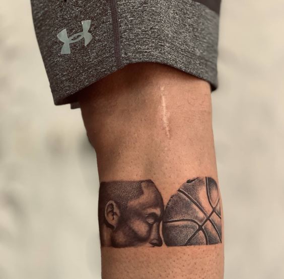 Kobe Bryant with Basketball Leg Band Tattoo
