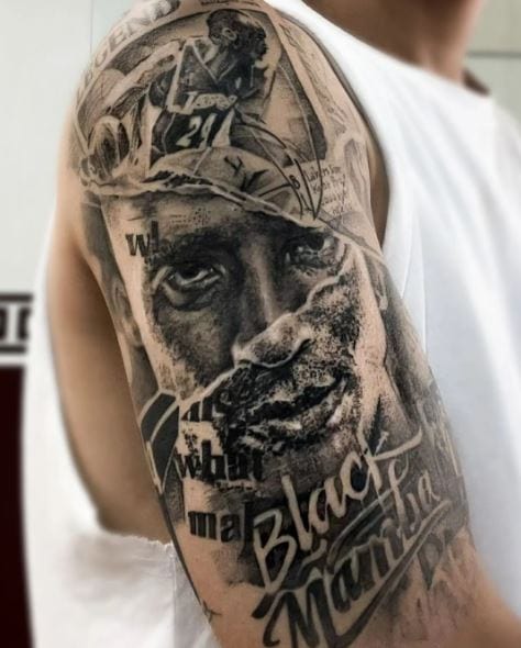 Black and Grey Kobe Bryant Portrait Arm Tattoo