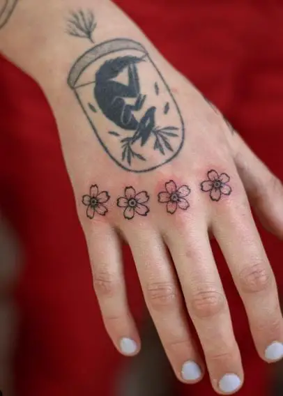 Minimalistic Flowers Knuckles Tattoo