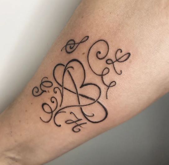 Initial Letters with Heart and Infinity Symbol Forearm Tattoo