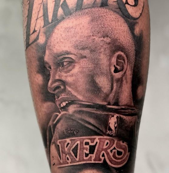 Kobe Bryant Biting Jersey Leg Tattoo