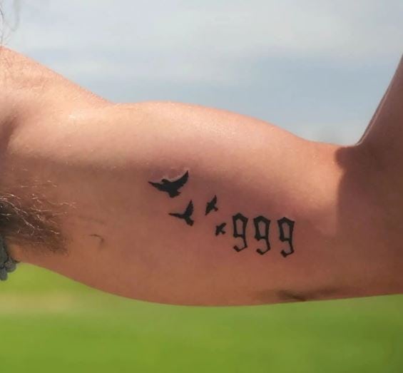 Black Birds and 999 Inner Biceps Tattoo