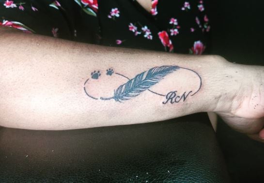 Initial Letters RN with Feather and Infinity Symbol Forearm Tattoo