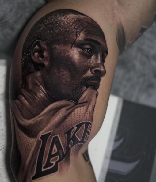 Realistic Kobe Bryant Biting Jersey Arm Tattoo