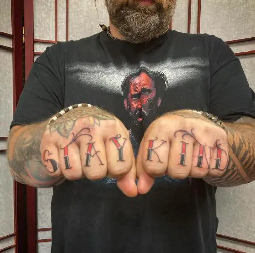 Black and Red Letters Knuckles Tattoo