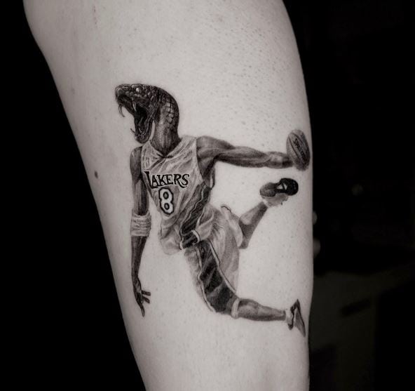 Kobe Bryant with Mamba Head Leg Tattoo