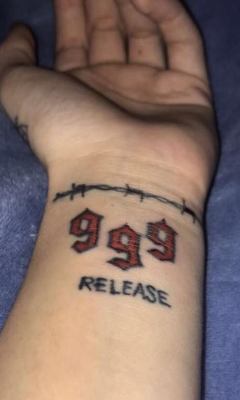 Barbed Wire and 999 with Script Wrist Tattoo