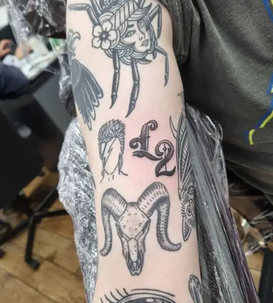 Spooky Patchwork Arm Tattoo