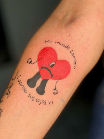 Colorful Sad Heart from Un Verano Sin Ti Cover Forearm Tattoo