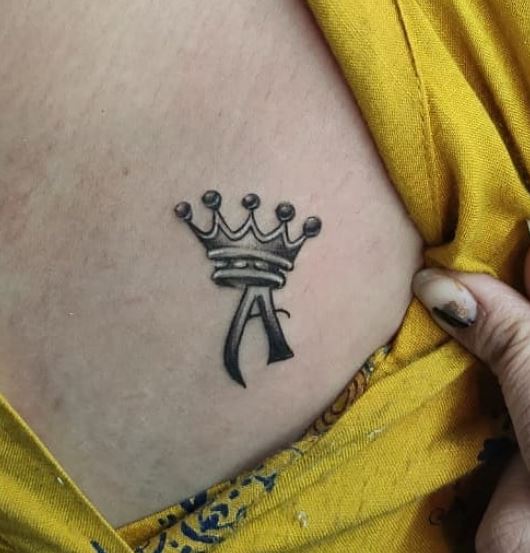 Shaded Initial Letter A with Crown Chest Tattoo