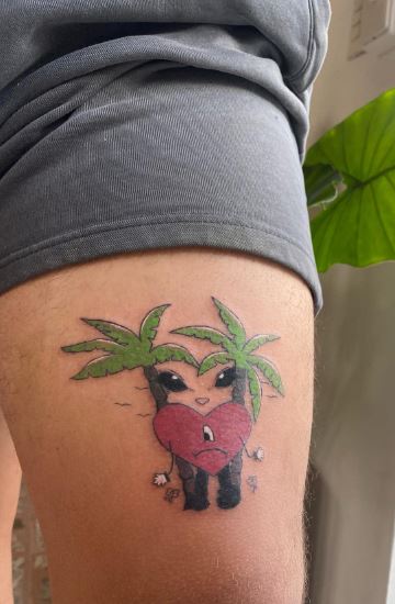 Palm Trees and Sad Heart from Un Verano Sin Ti Cover Thigh Tattoo