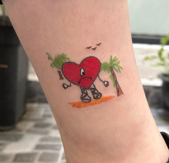 Palm Trees and Sad Heart from Un Verano Sin Ti Cover Ankle Tattoo