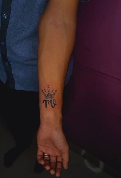 Initial Letters TV with Crown Forearm Tattoo