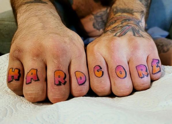 Colorful Lettering Knuckles Tattoo