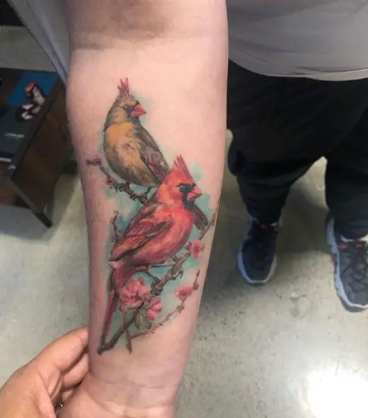 Flowers and Two Cardinals on Branches Forearm Tattoo