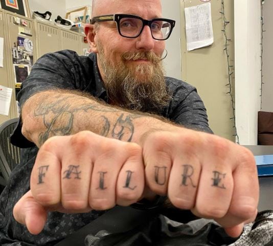 Black and Grey Lettering Knuckles Tattoo