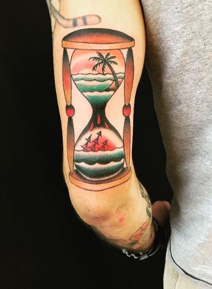 Colorful Life and Death Hourglass Arm Tattoo