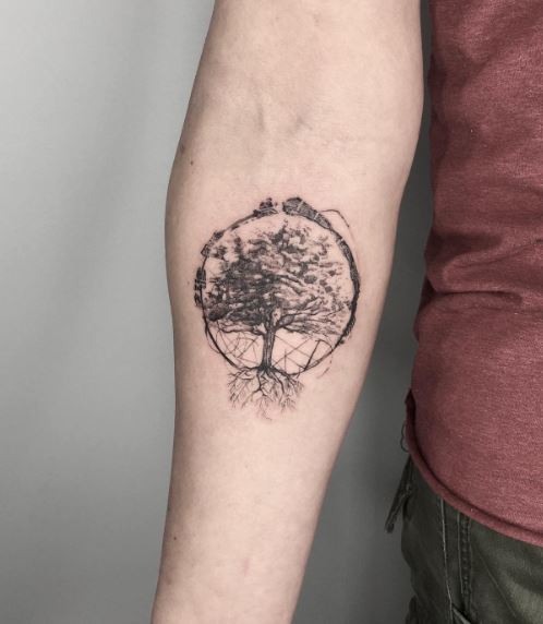 Circle and Oak Tree Forearm Tattoo