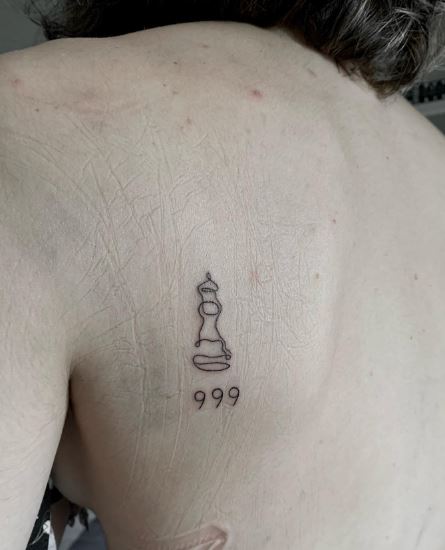 Minimalistic Black 999 Back Tattoo