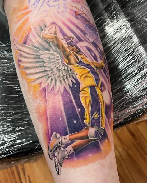 Kobe Bryant with Halo and Angel Wings Forearm Tattoo