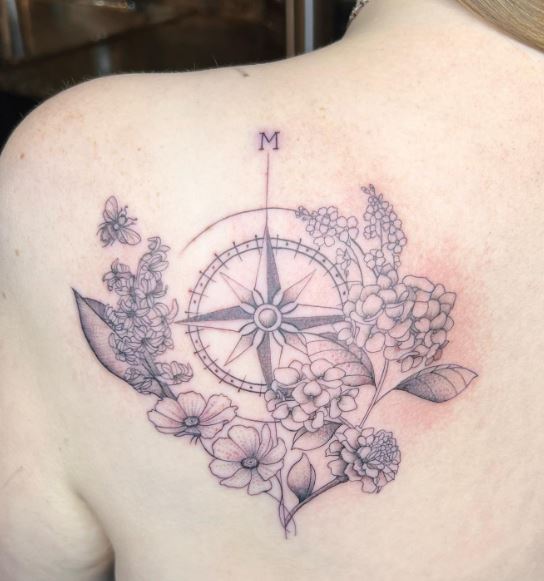 Initial Letter M with Flowers and Compass Back Tattoo