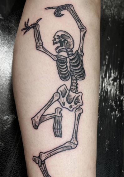 Black and Grey Dancing Skeleton Forearm Tattoo