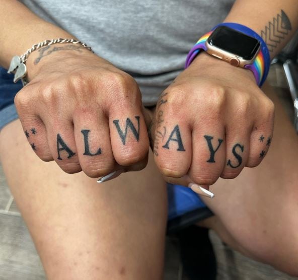 Stars and Lettering Knuckles Tattoo
