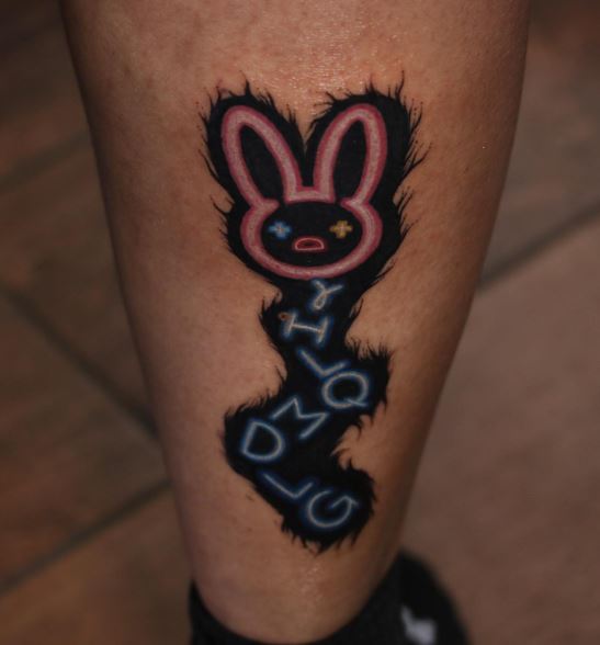 Hairy Bad Bunny Logo and YHLQMDLG Calf Tattoo