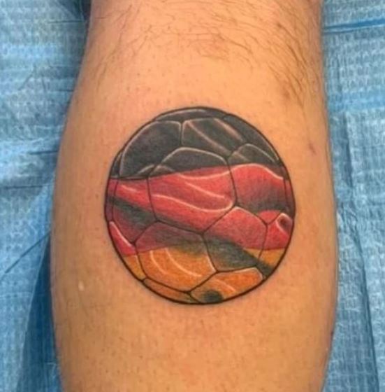 German Flag Colors in Football Ball Leg Tattoo
