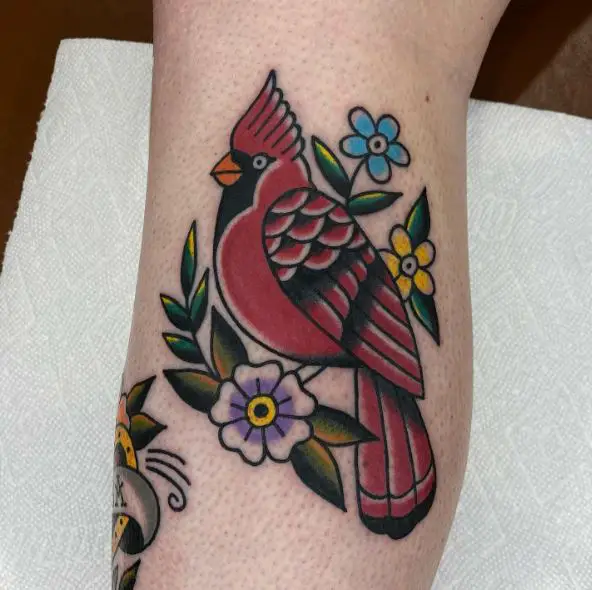 Traditional Flowers with Leaves and Cardinal Leg Tattoo