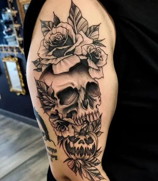Black and Grey Skull, Flowers, Leaves and Pumpkin Tattoo