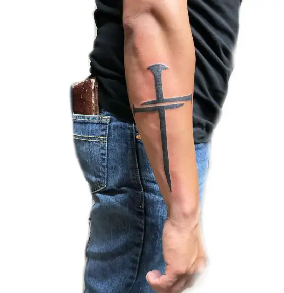 Bold Black Ink Cross Forearm Tattoo