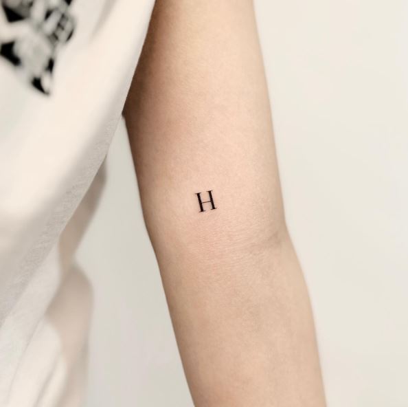 Simple Single Letter Initial Mini Tattoo