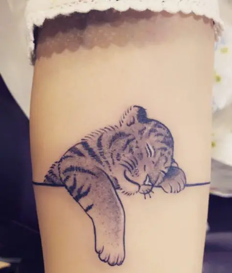 Sleeping Tiger Cub Arm Tattoo