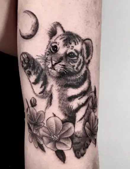 Half Moon, Flowers and Tiger Cub Arm Tattoo